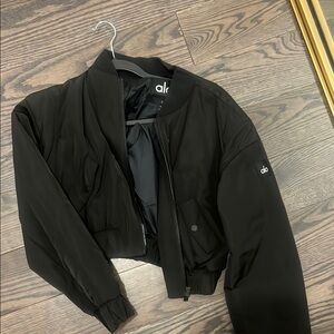 ALO break line cropped bomber jacket in black